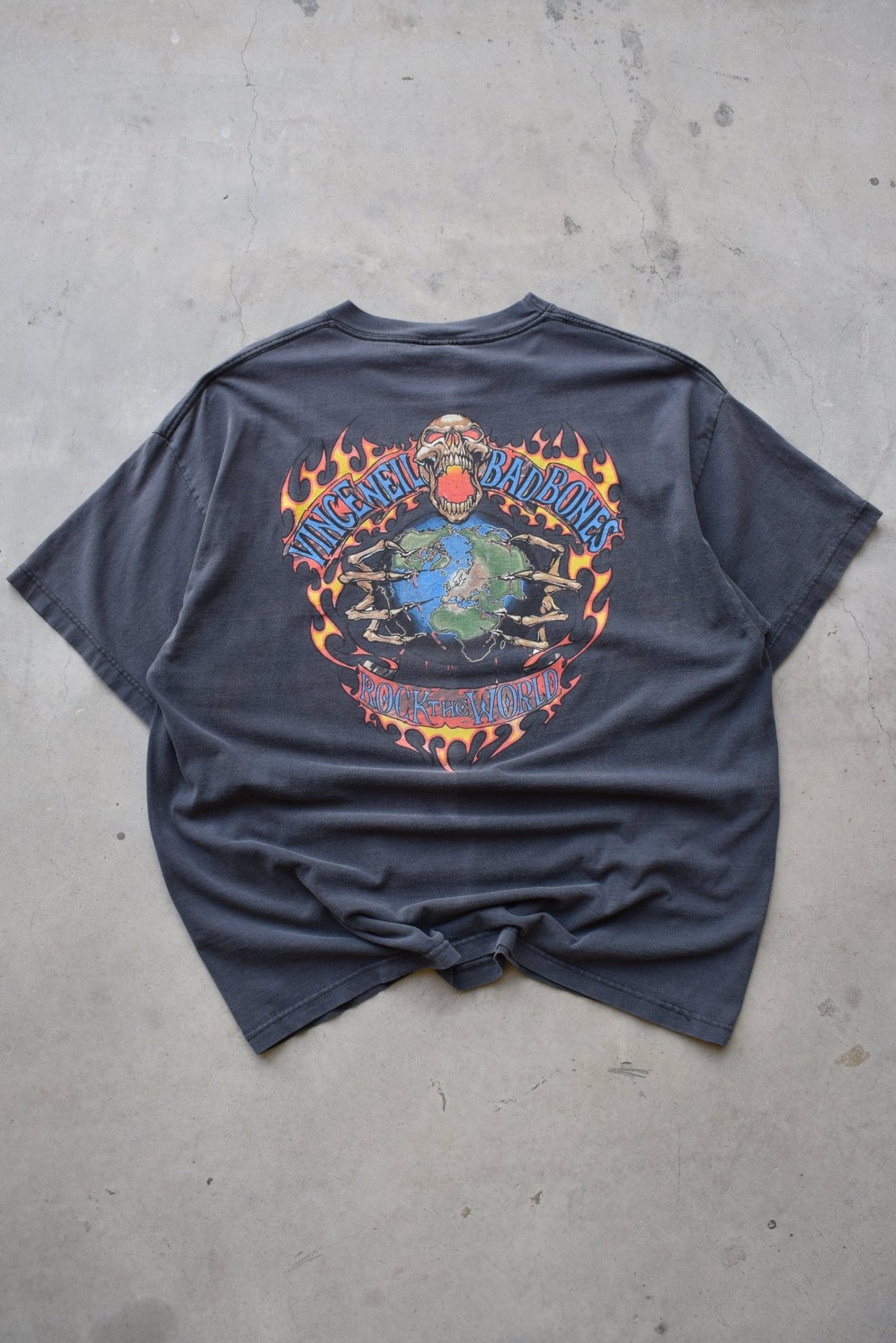 Bad Bones 'Rock The World' Faded-Black Graphic Tee — 1990s (XXL) - Retrospective Store