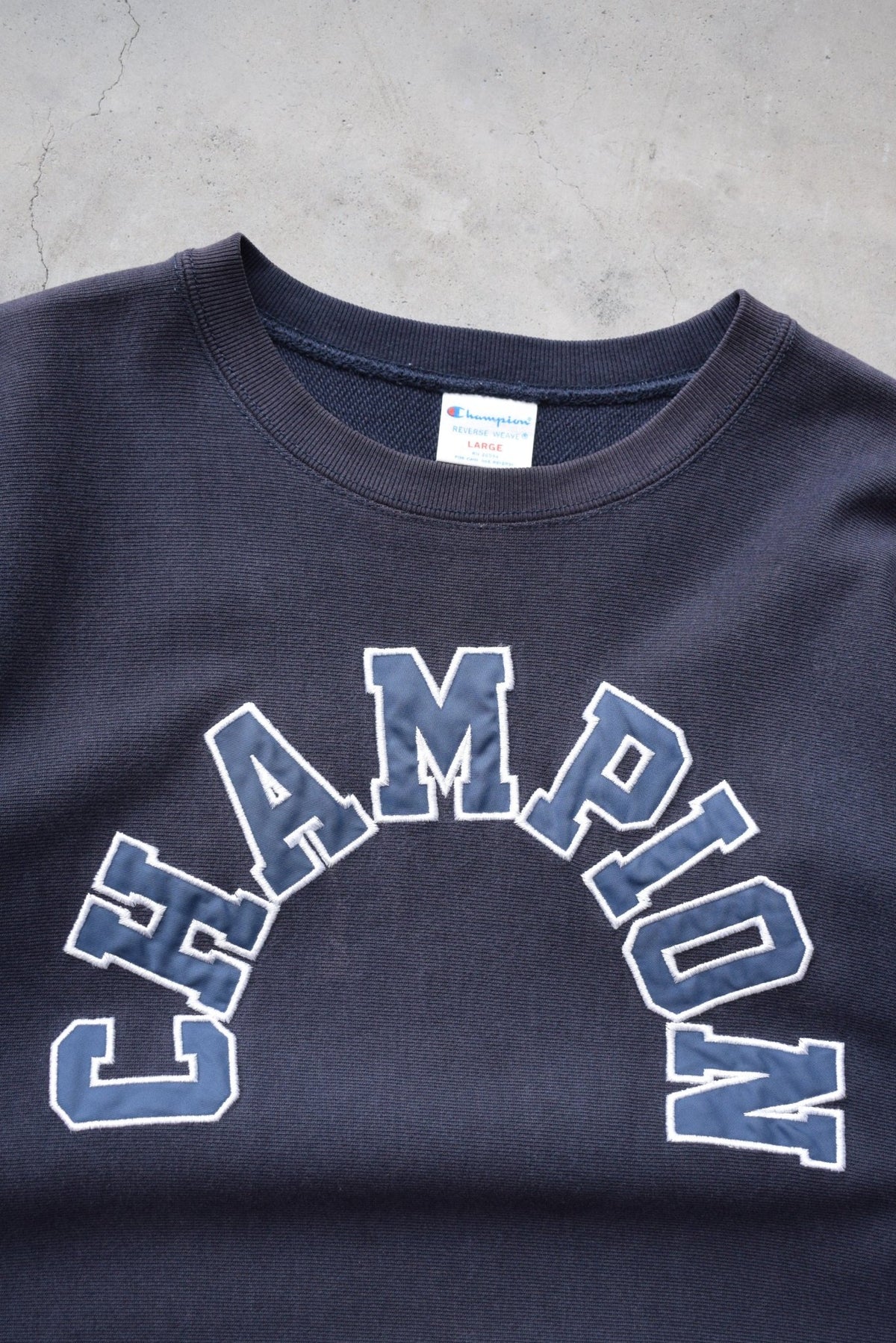 Champion Reverse-Weave Navy Embroidered Spellout Crewneck — 2000s (S) - Retrospective Store