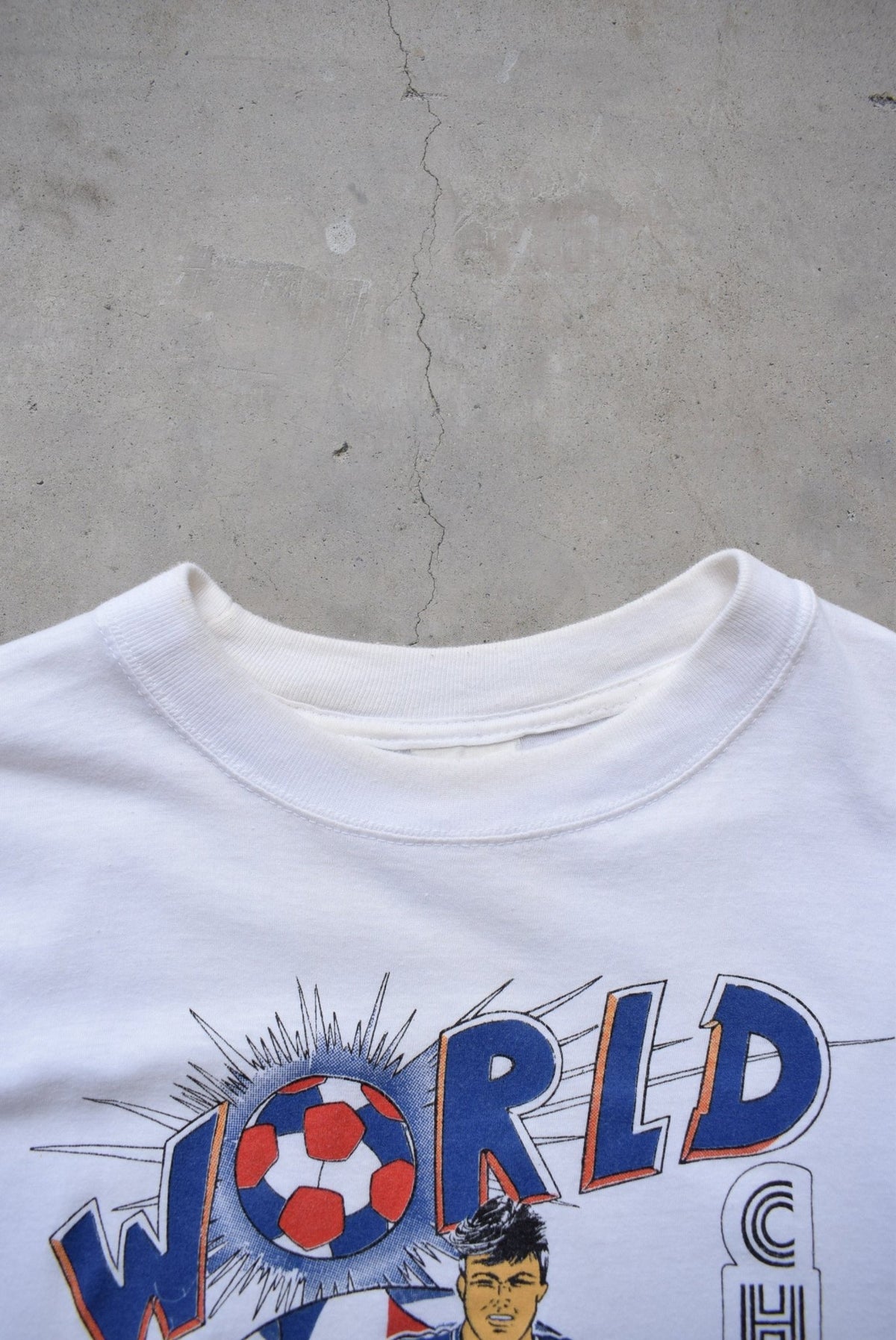 Football World Champion White Graphic Tee — 1990s (M) - Retrospective Store