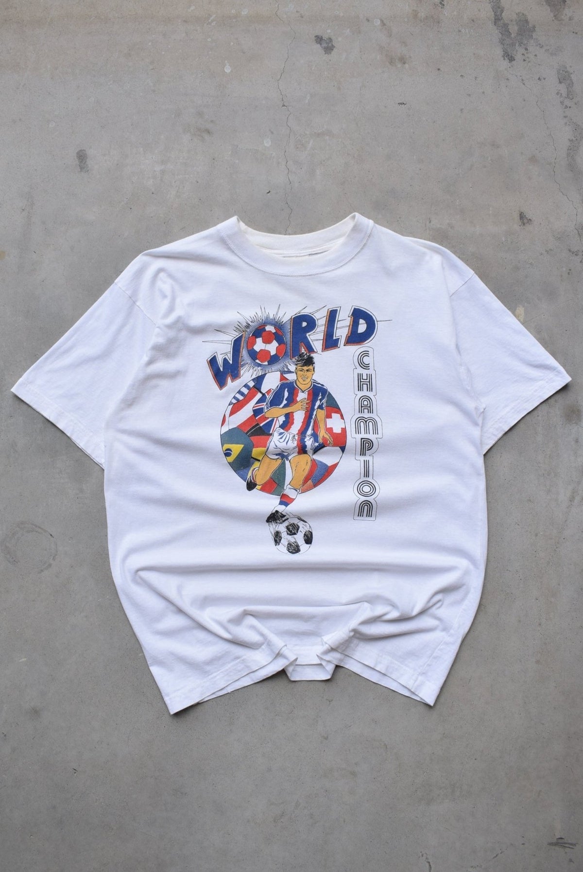 Football World Champion White Graphic Tee — 1990s (M) - Retrospective Store
