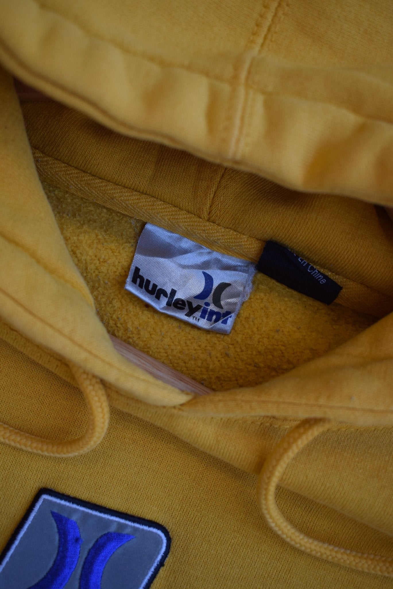 Hurley International Embroidered Spellout Hoodie — 2000s (L) - Retrospective Store