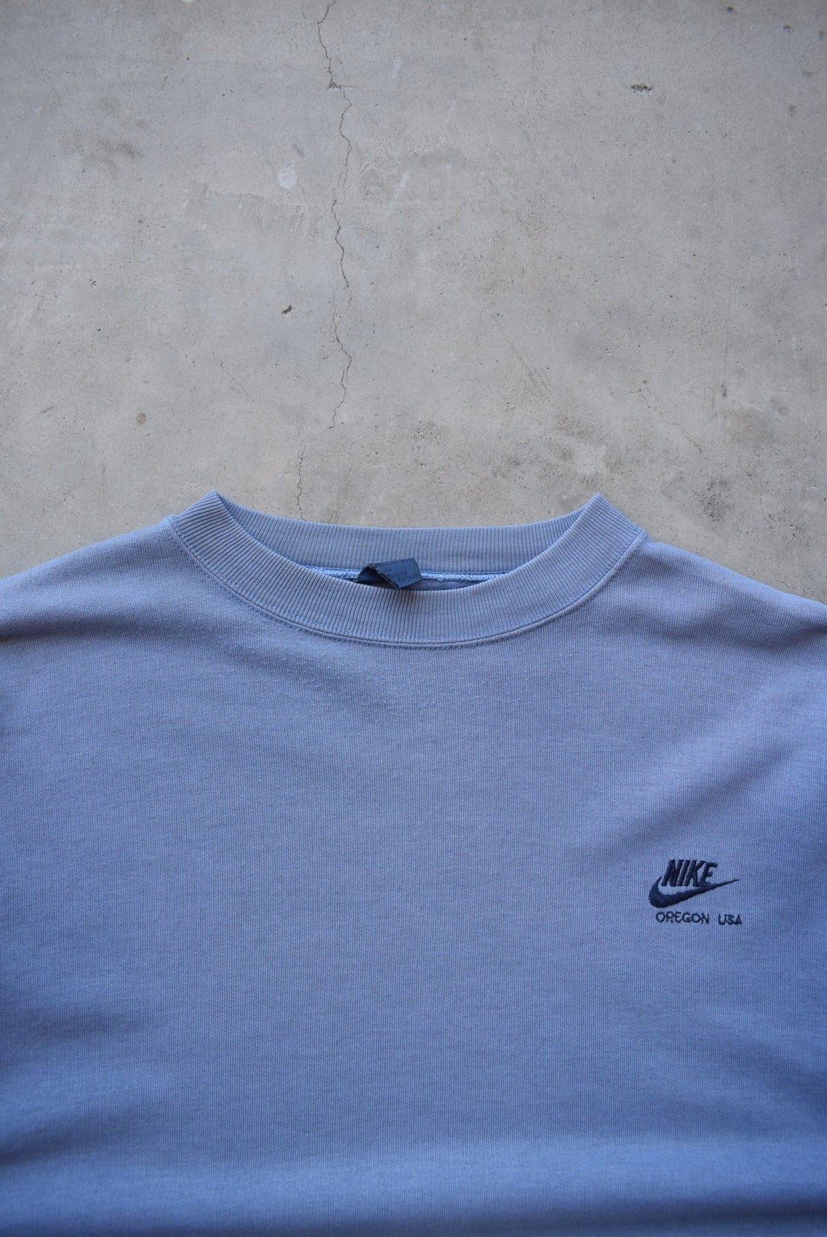 Nike Baby-Blue Embroidered Spellout Crewneck — 1980s (L/XL) - Retrospective Store