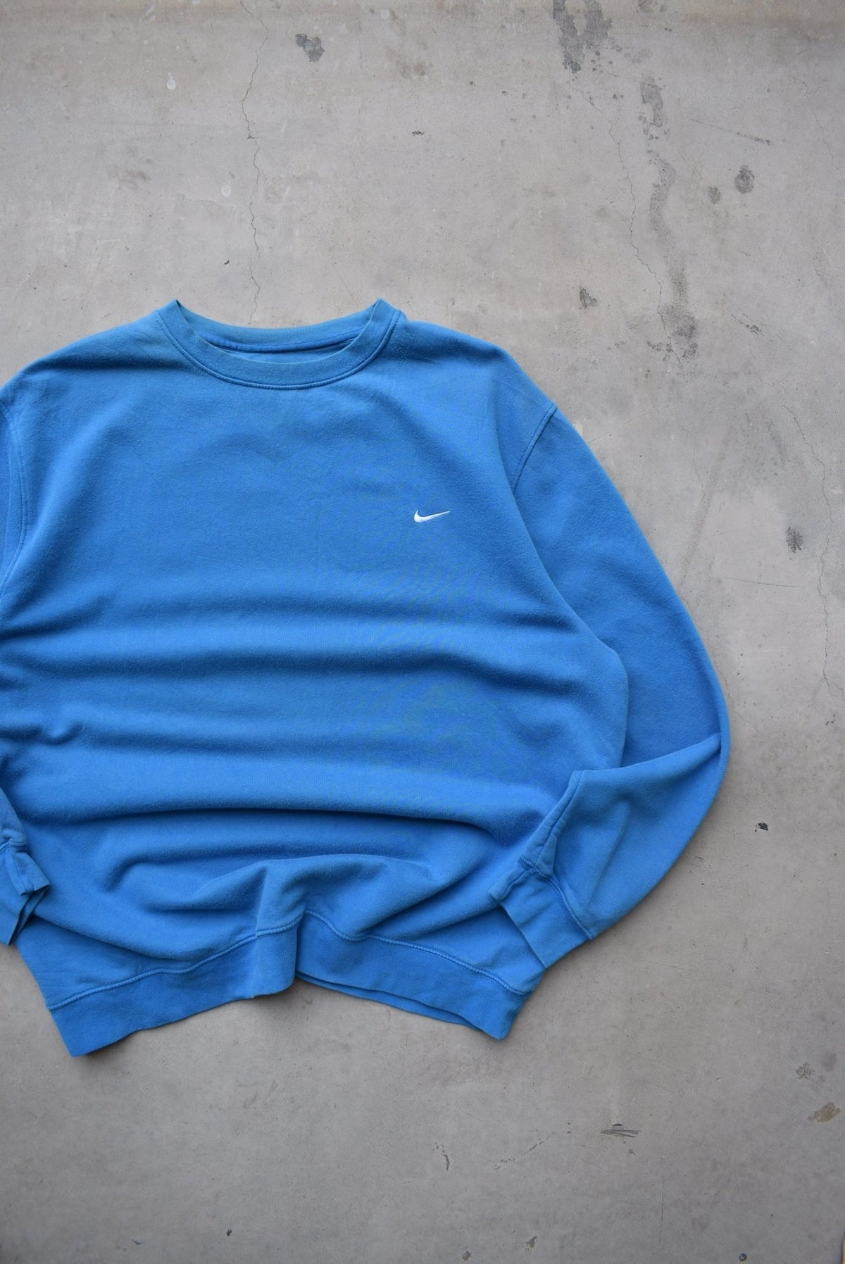 Nike Blue Embroidered Swoosh Crewneck — 2000s (XXL) - Retrospective Store