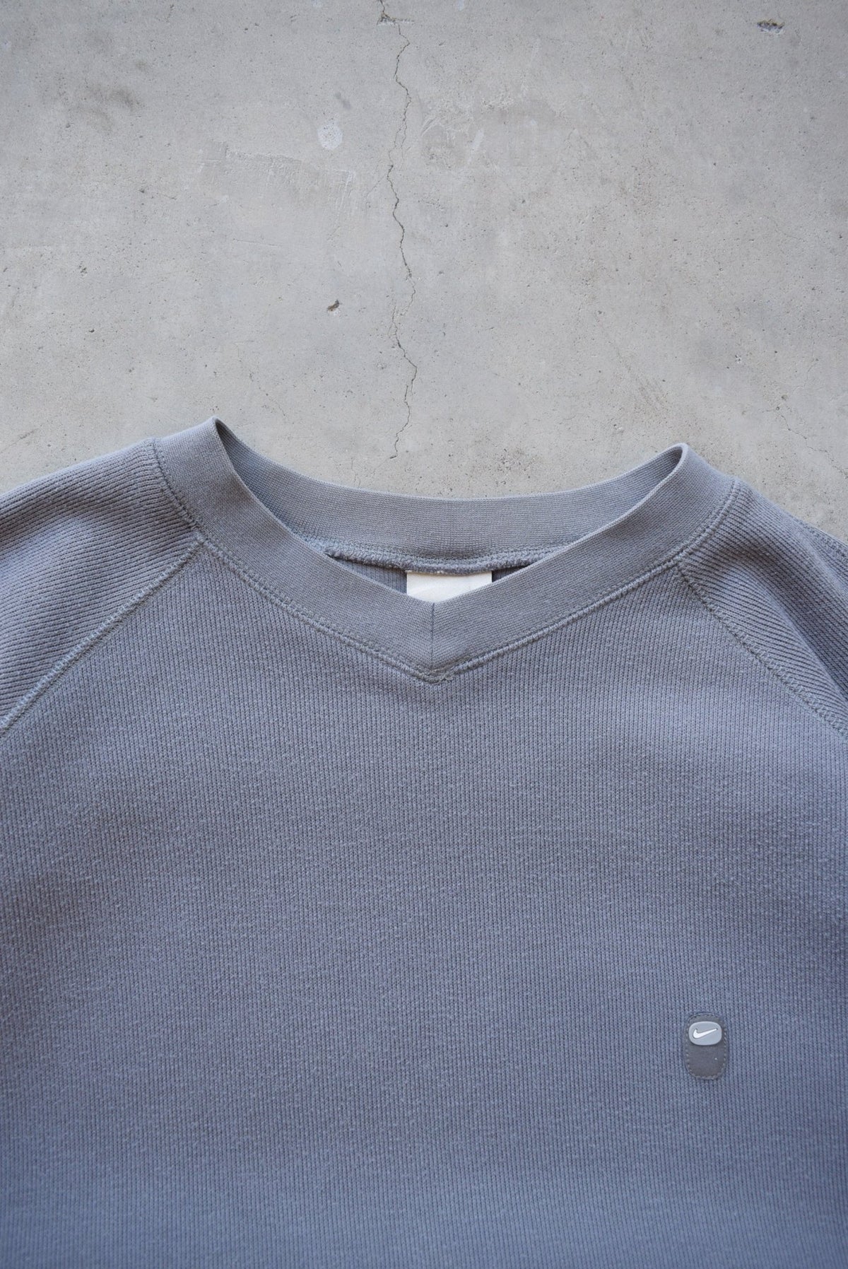 Nike Grey Embroidered Swoosh Crewneck — 2000s (L/XL) - Retrospective Store