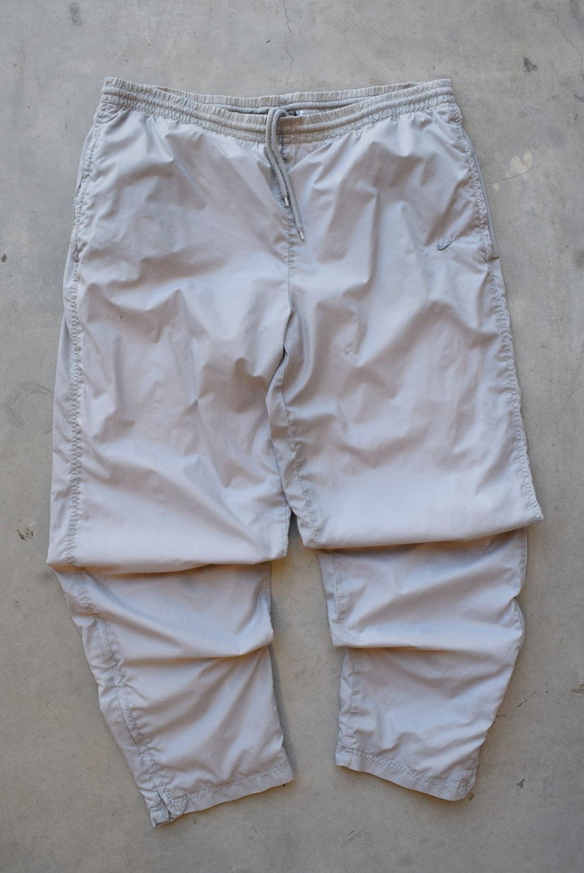 Nike Grey Embroidered Swoosh Track Pants — 2000s (XL/XXL) - Retrospective Store