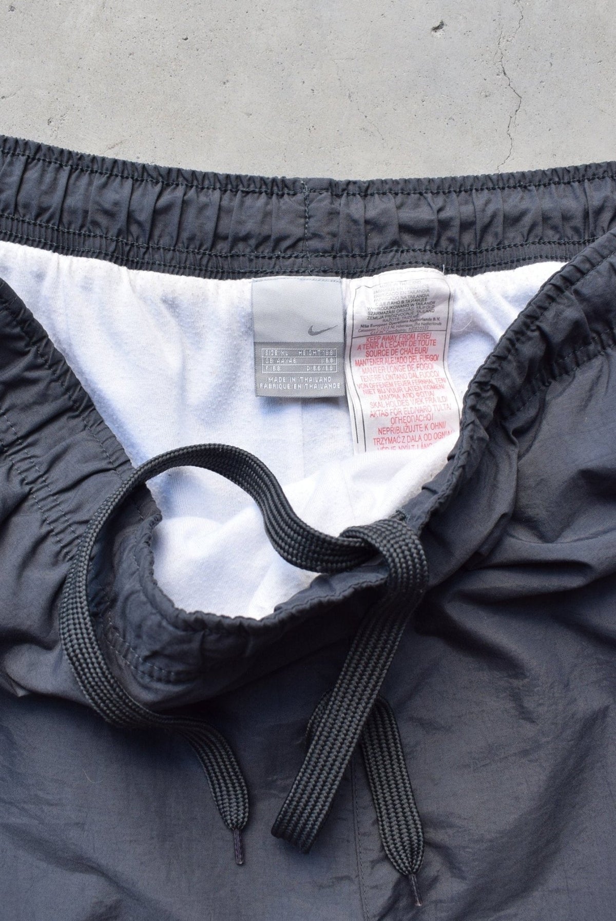 Nike Grey & White Embroidered Swoosh Track Pants — 2000s (XL) - Retrospective Store