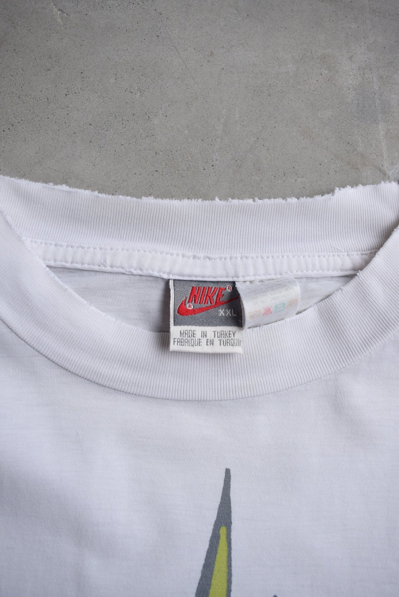 Nike International White Graphic Tee — 1990s (XL) - Retrospective Store