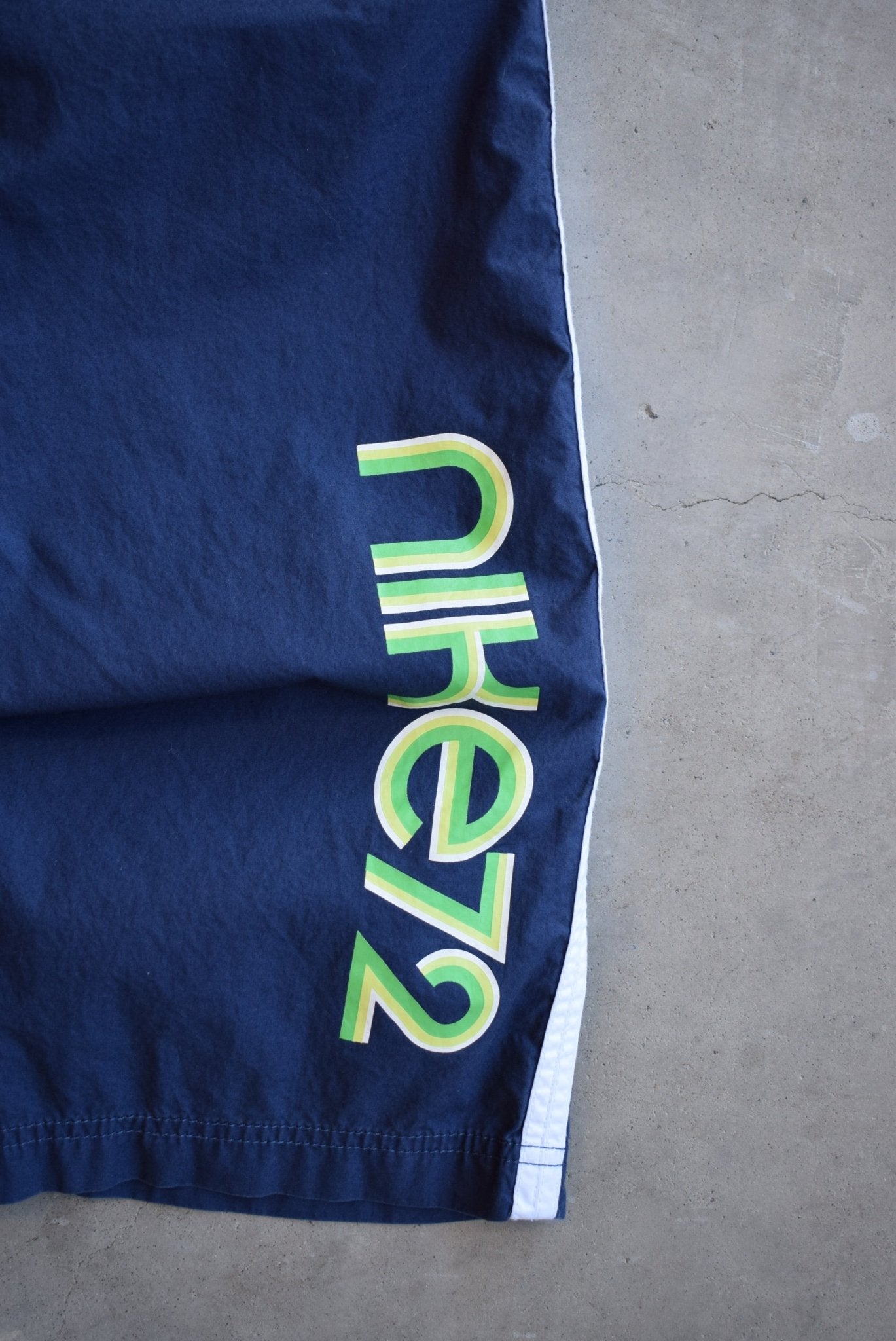 Nike Navy Embroidered Swoosh 3/4 Track Pants — 2000s (XS/S) - Retrospective Store