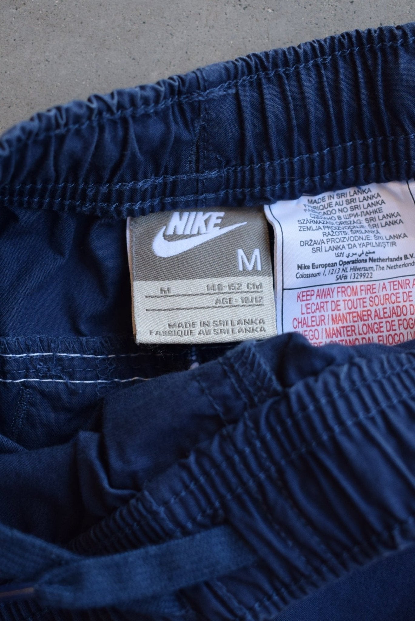 Nike Navy Embroidered Swoosh 3/4 Track Pants — 2000s (XS/S) - Retrospective Store