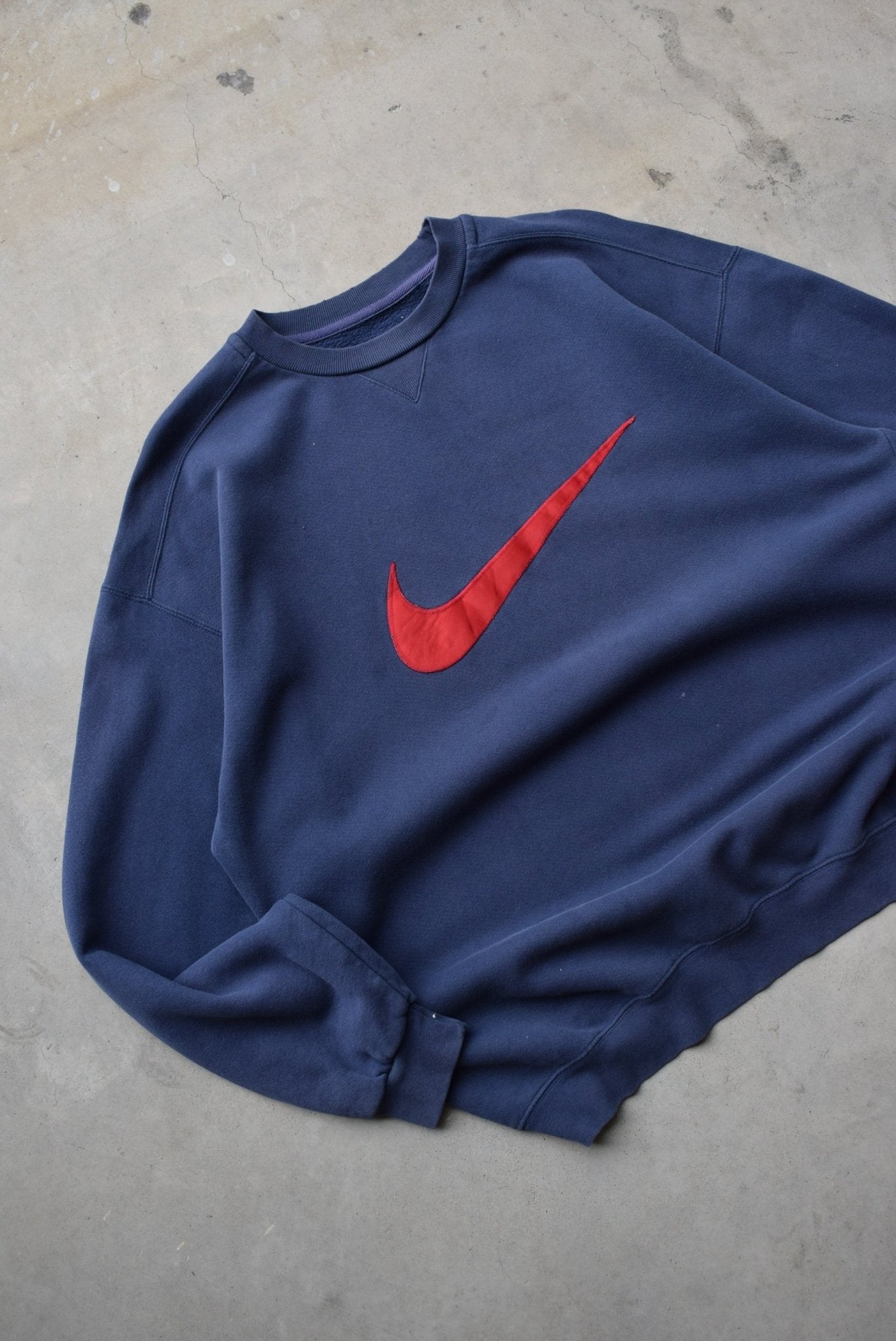 Nike Navy Embroidered Swoosh Crewneck — 1990s (XL) - Retrospective Store