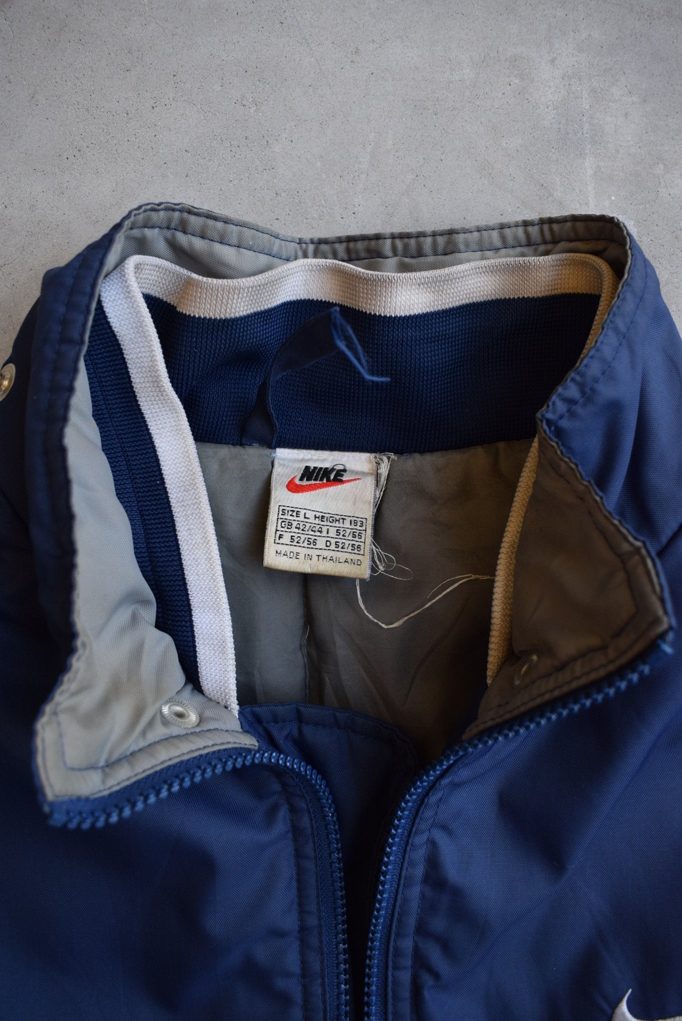 Nike Navy Embroidered Swoosh Heavyweight Jacket — 1990s (L/XL) - Retrospective Store