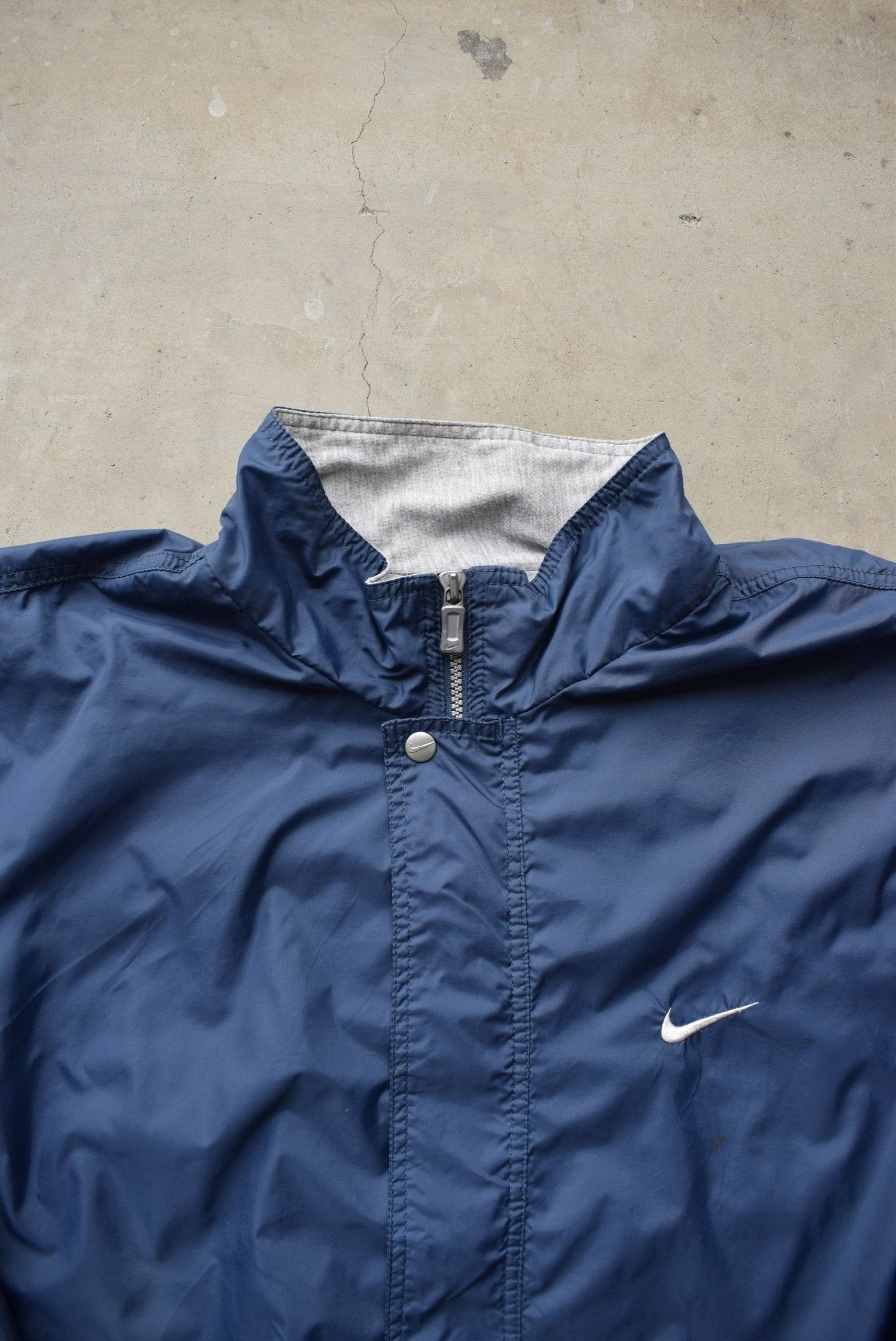 Nike Navy Embroidered Swoosh Jacket — 1990s (XL/XXL) - Retrospective Store