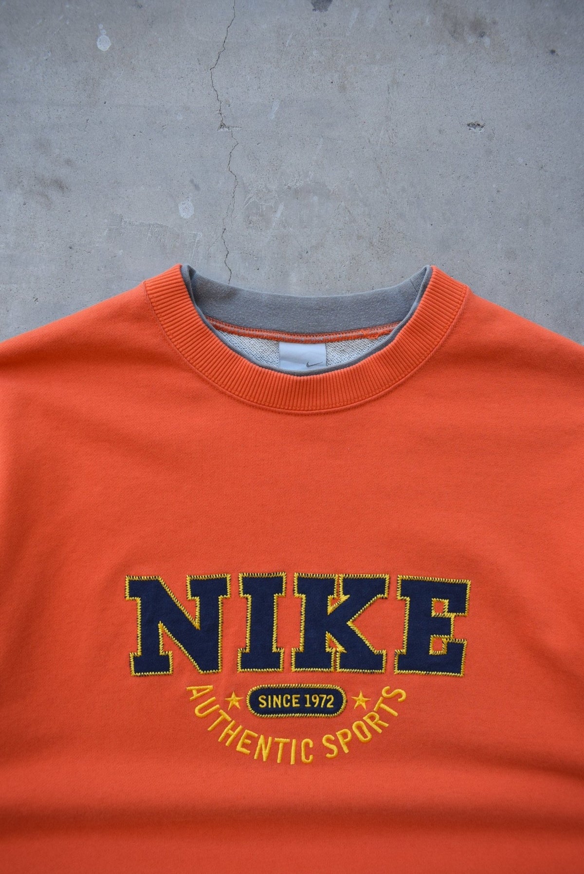 Nike Orange Embroidered Spellout Crewneck — 2000s (L/XL) - Retrospective Store