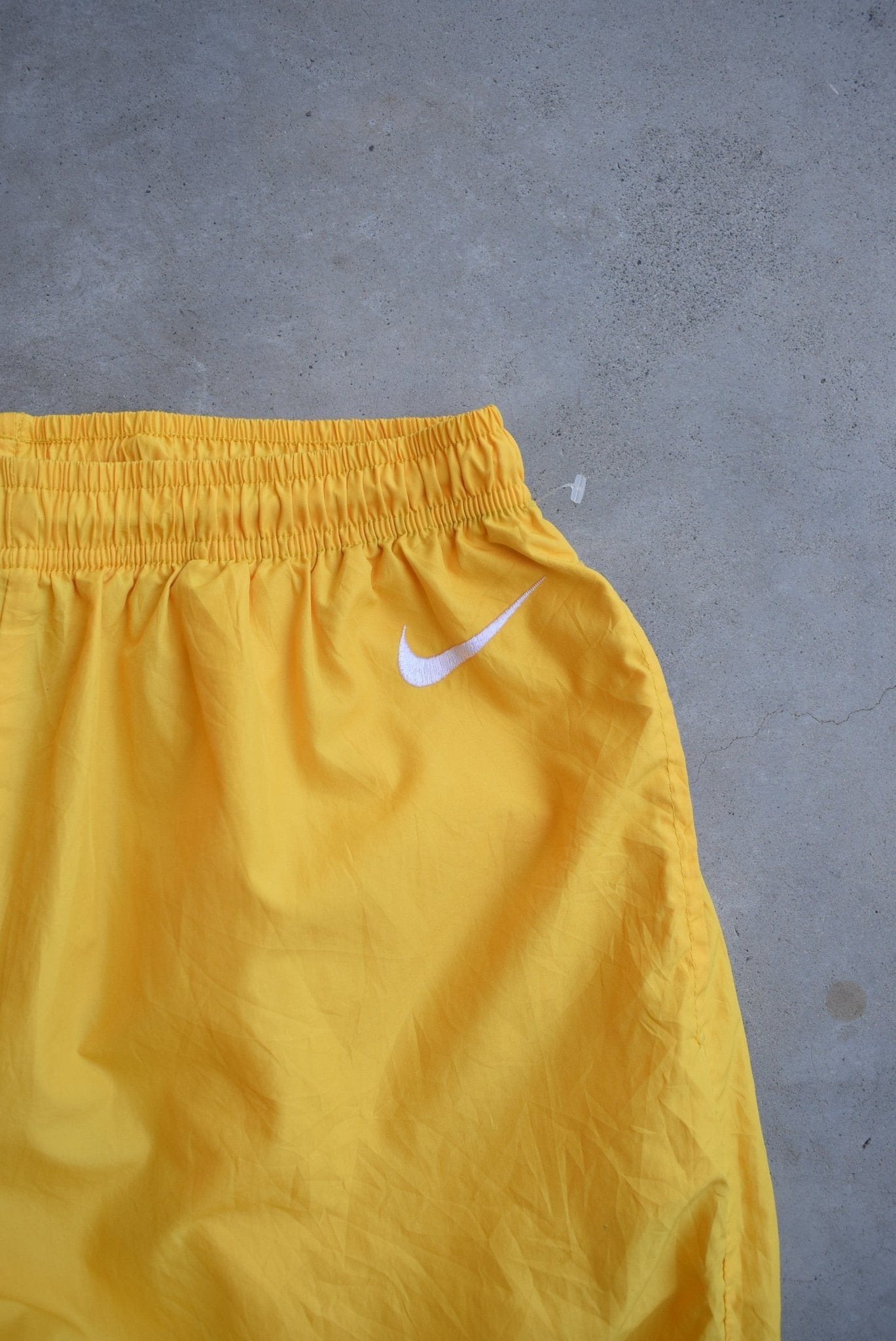 Nike Yellow Embroidered Swoosh Track Pants — 1990s (XS) - Retrospective Store