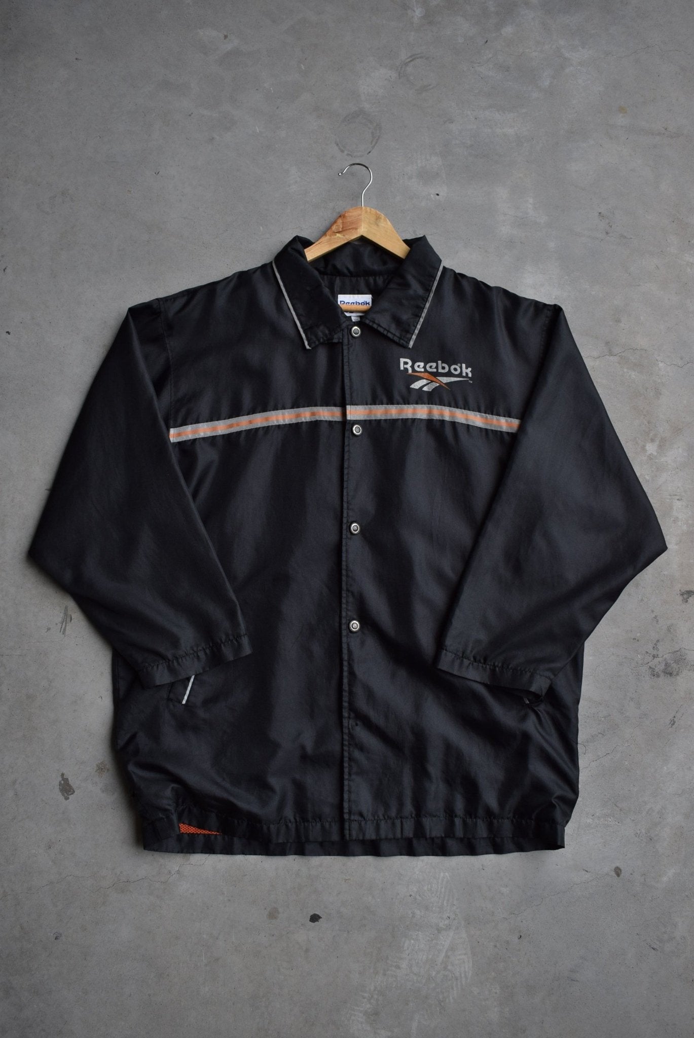 Reebok Spellout Windbreaker Jacket — 1990s (XL/XXL) - Retrospective Store