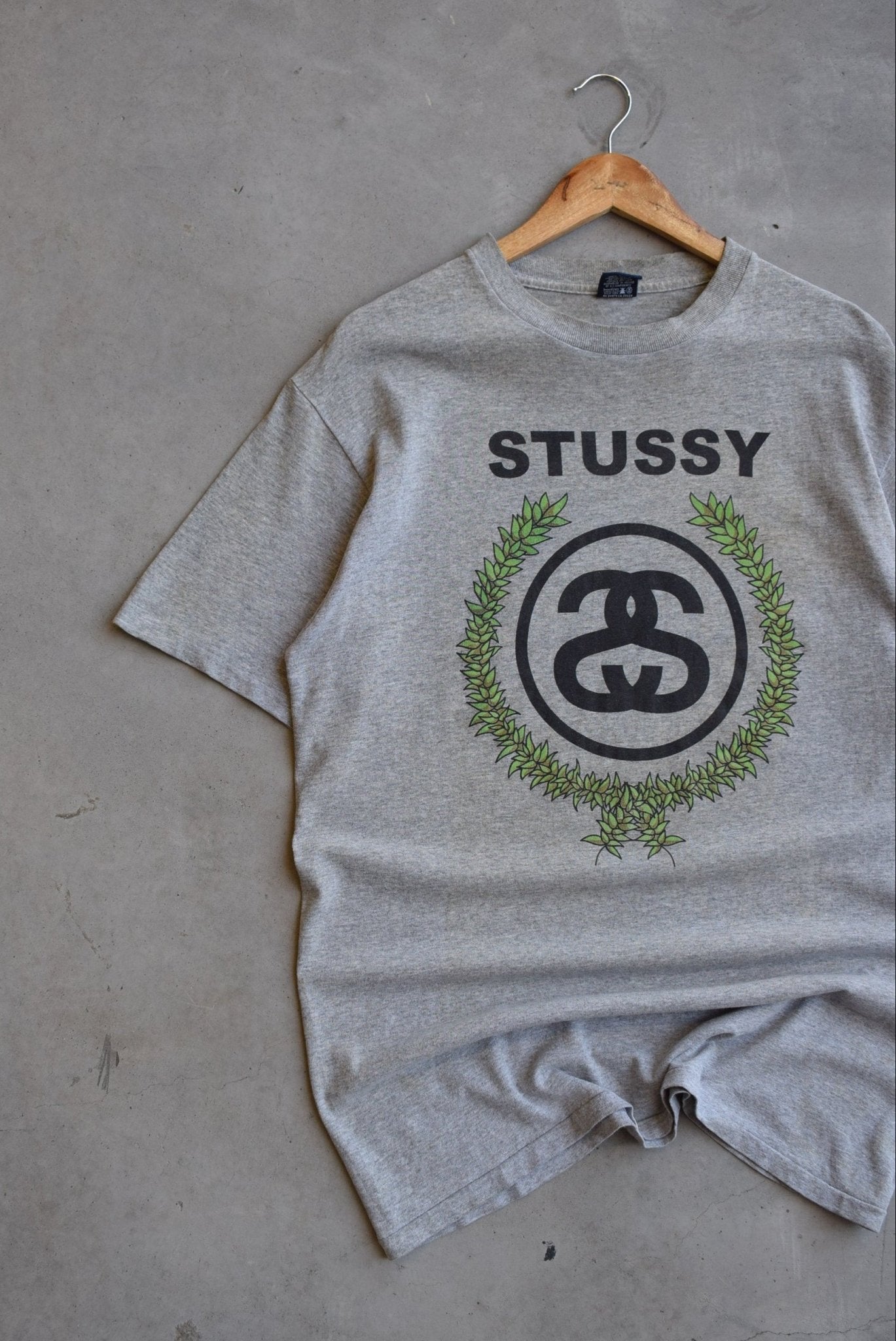 Stussy Grey Spellout Graphic Tee — 2000s (L) - Retrospective Store