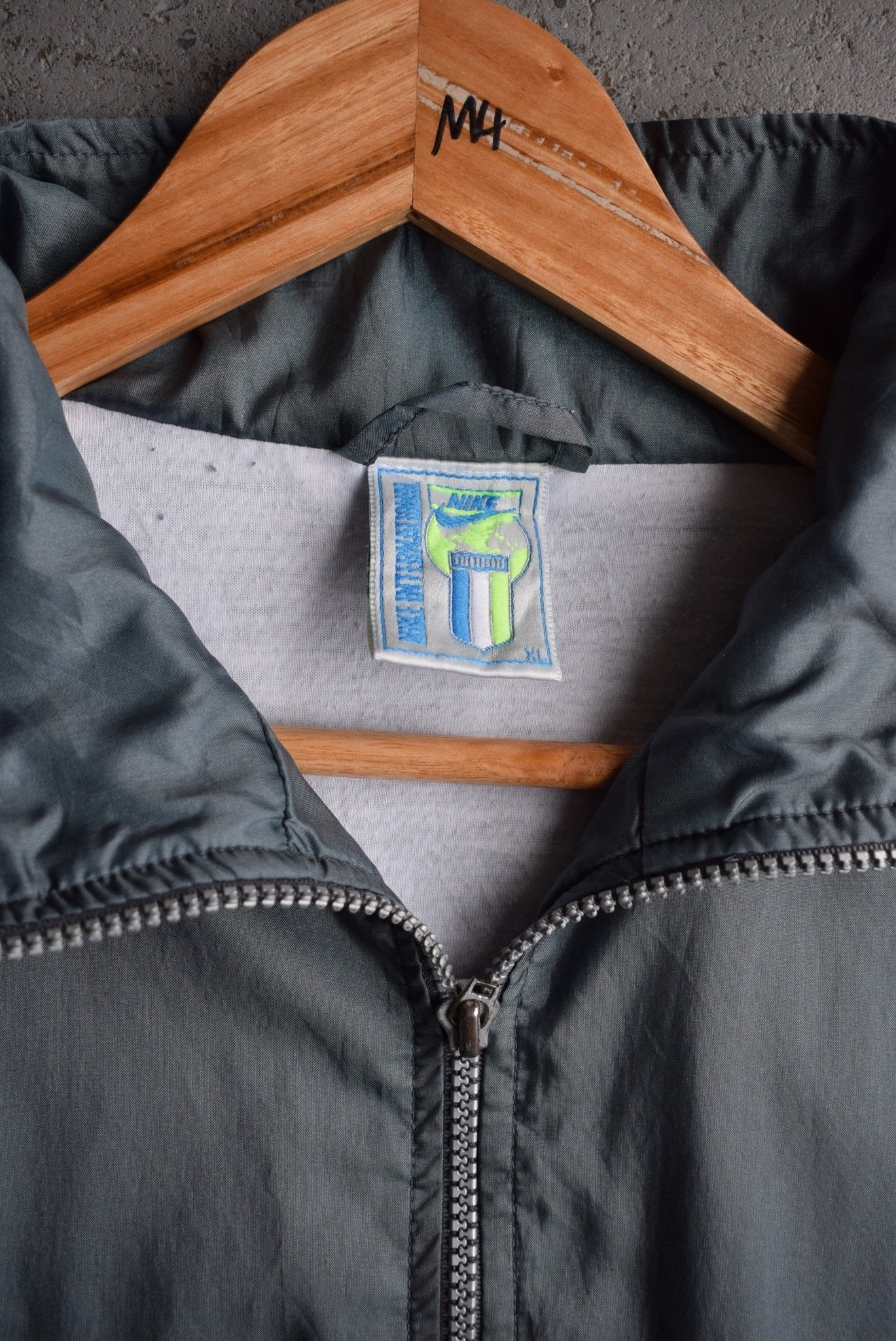 Vintage 90s Nike International Embroidered Jacket (XL) - Retrospective Store