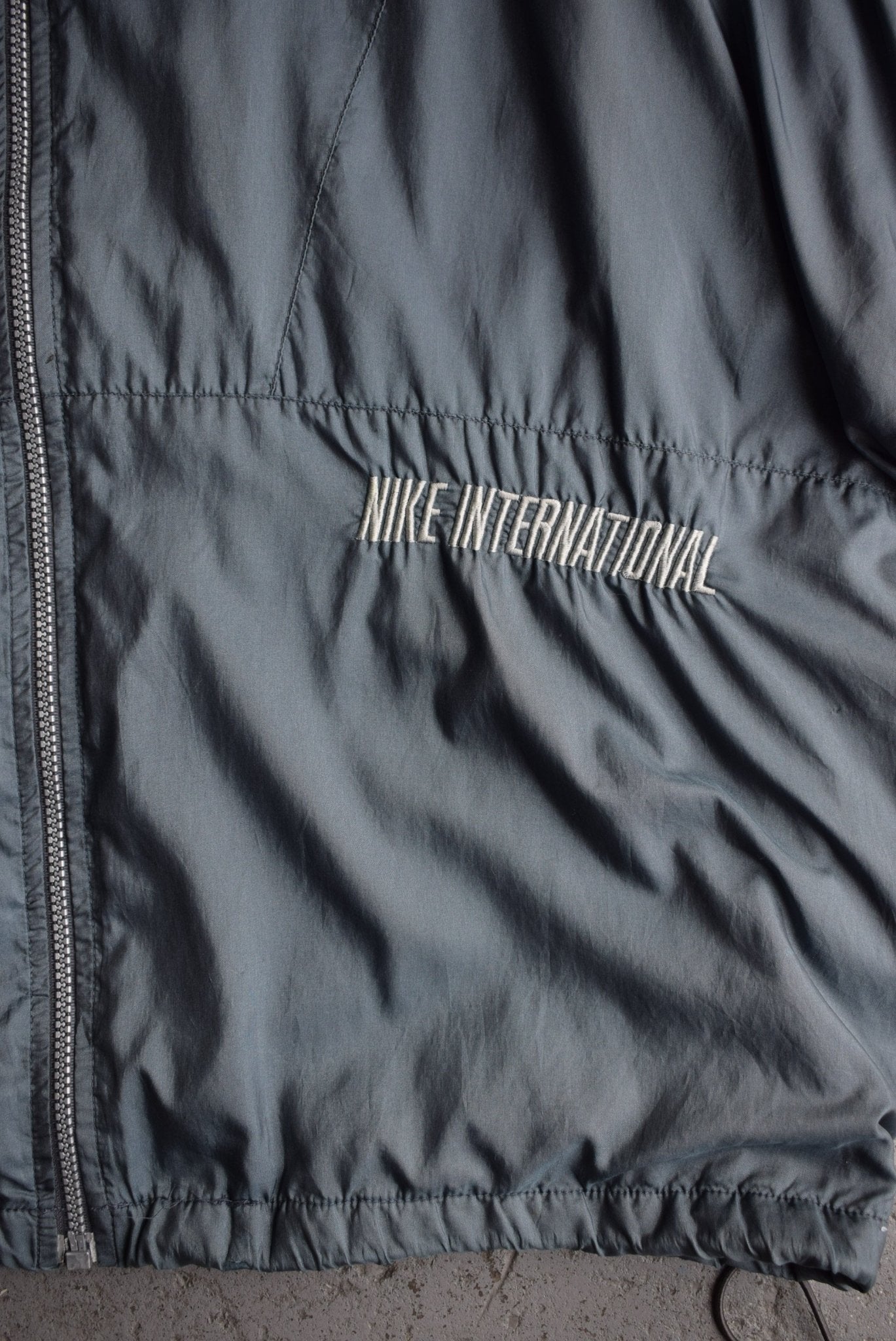 Vintage 90s Nike International Embroidered Jacket (XL) - Retrospective Store