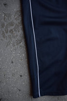 Vintage Nike Classic Logo Embroidered Track Pants (M/L) - Retrospective Store