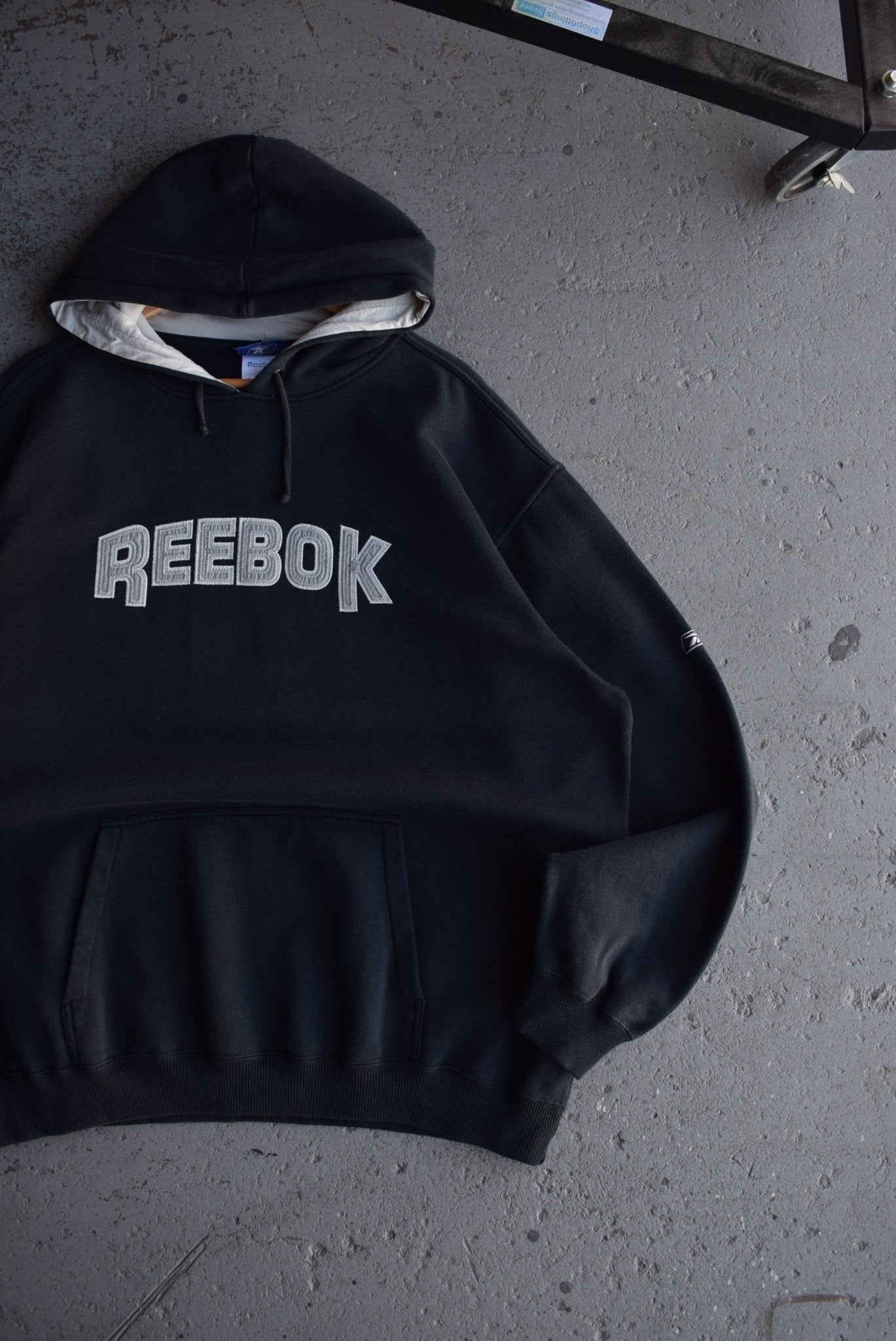 Vintage Reebok Embroidered Spellout Hoodie (XL) - Retrospective Store