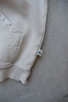 Adidas Cream Embroidered Spellout Hoodie — 1990s (S/M) - Retrospective Store