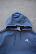 Adidas Faded-Blue Embroidered Logo Hoodie — 1990s (M) - Retrospective Store