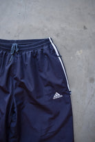 Adidas Navy Embroidered Logo Track Pants — 2000s (L/XL) - Retrospective Store