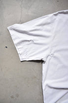 Adidas White Embroidered Spellout Tee — 1990s (XXL) - Retrospective Store