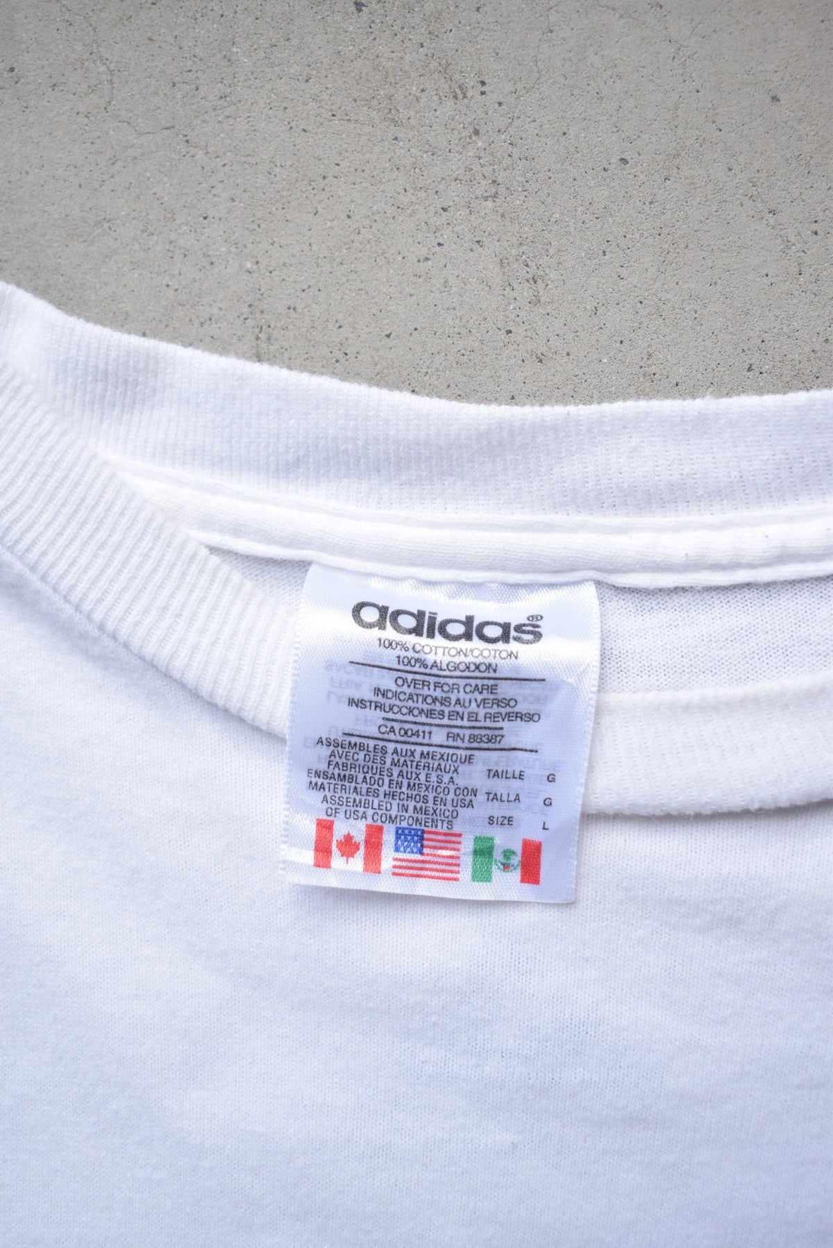 Adidas White Graphic Tee — 1990s (XL/XXL) - Retrospective Store
