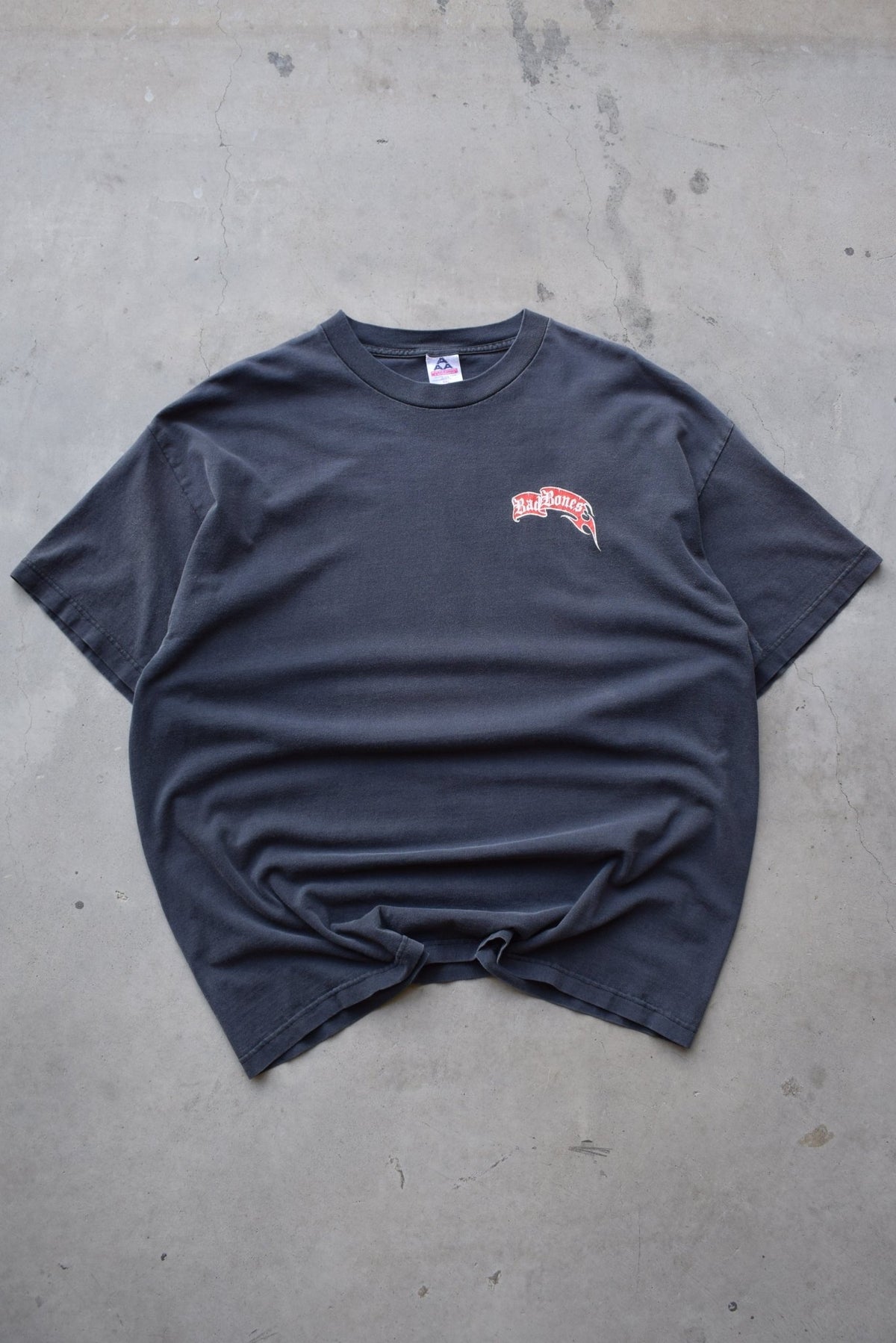 Bad Bones 'Rock The World' Faded-Black Graphic Tee — 1990s (XXL) - Retrospective Store