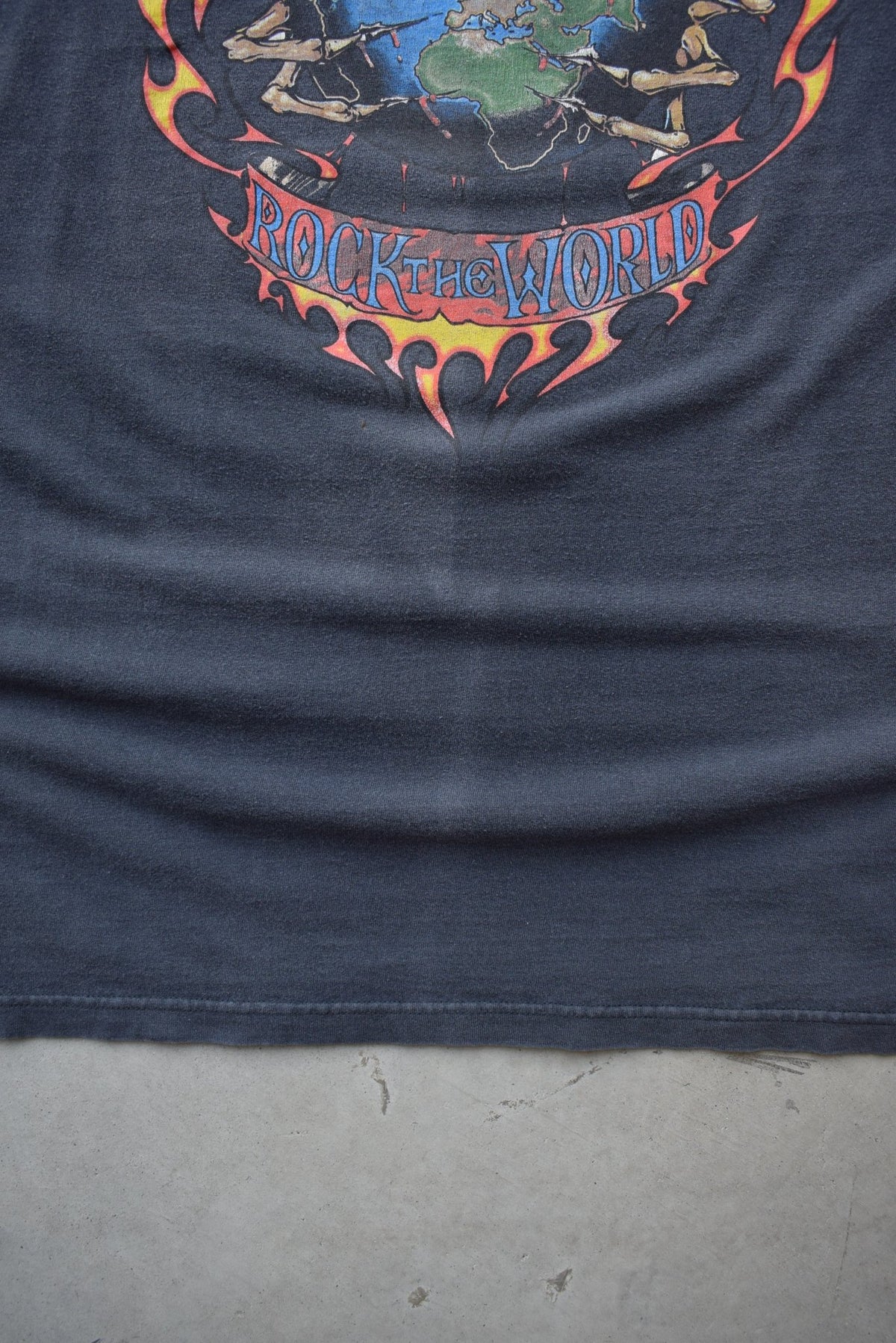 Bad Bones 'Rock The World' Faded-Black Graphic Tee — 1990s (XXL) - Retrospective Store