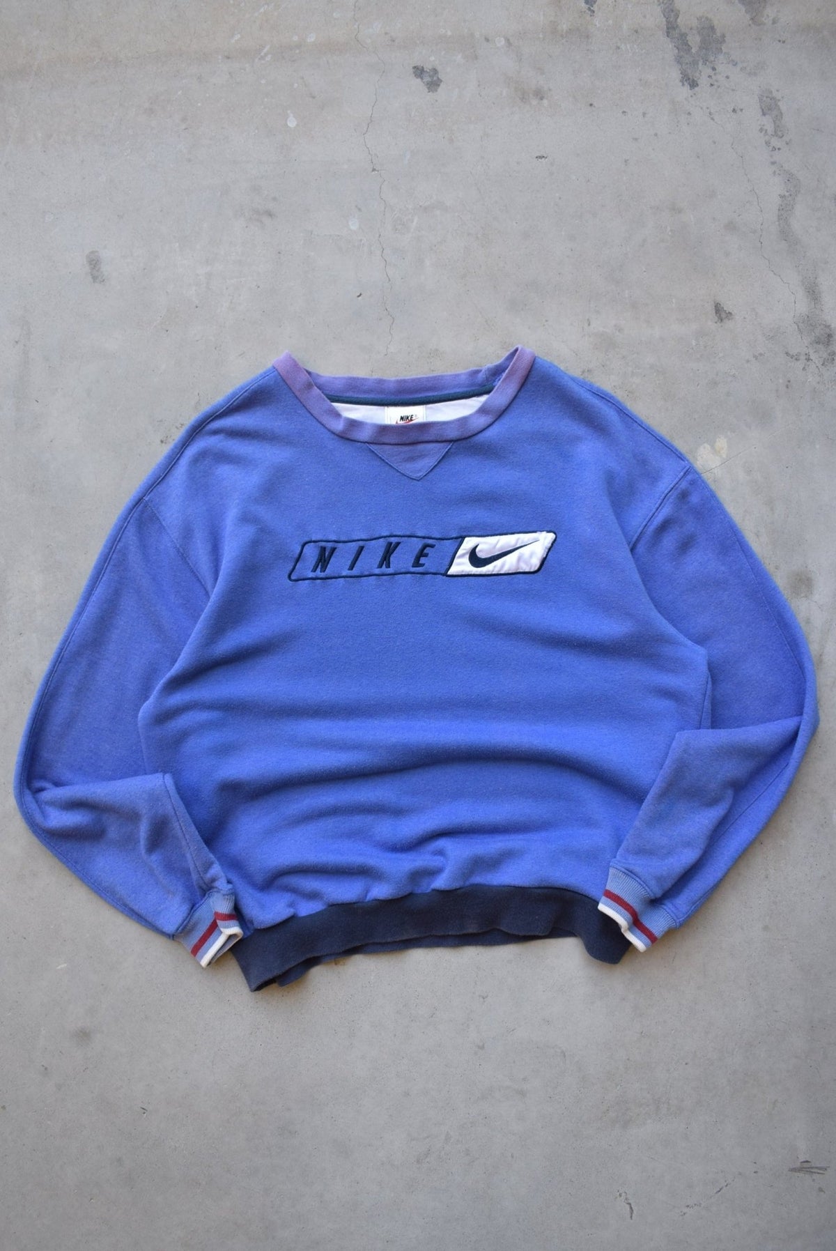 Bootleg Nike Baby-Blue Embroidered Spellout Crewneck — 1990s (S/M) - Retrospective Store