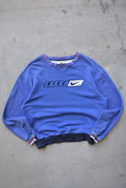 Bootleg Nike Baby-Blue Embroidered Spellout Crewneck — 1990s (S/M) - Retrospective Store