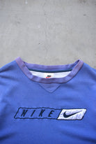 Bootleg Nike Baby-Blue Embroidered Spellout Crewneck — 1990s (S/M) - Retrospective Store