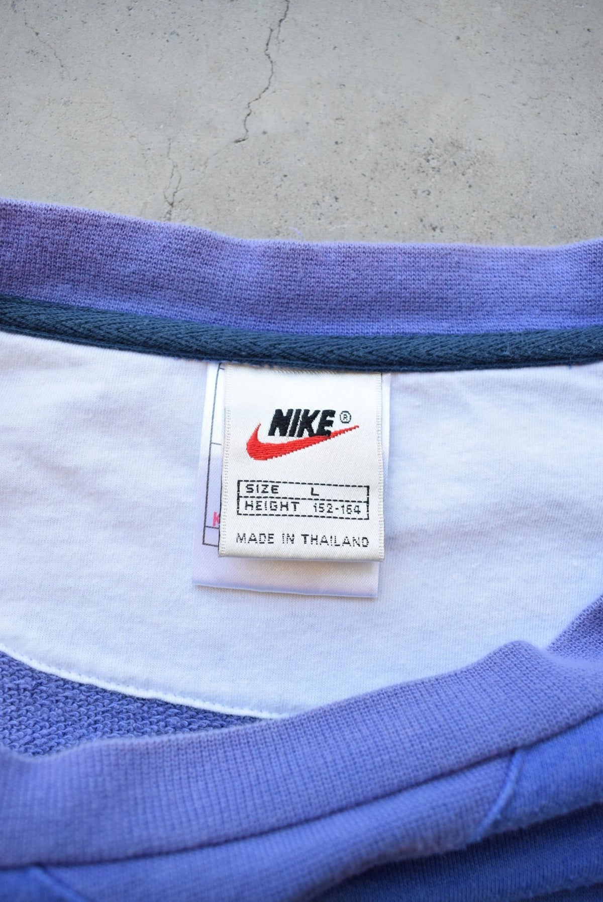 Bootleg Nike Baby-Blue Embroidered Spellout Crewneck — 1990s (S/M) - Retrospective Store
