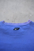 Bootleg Nike Baby-Blue Embroidered Spellout Crewneck — 1990s (S/M) - Retrospective Store