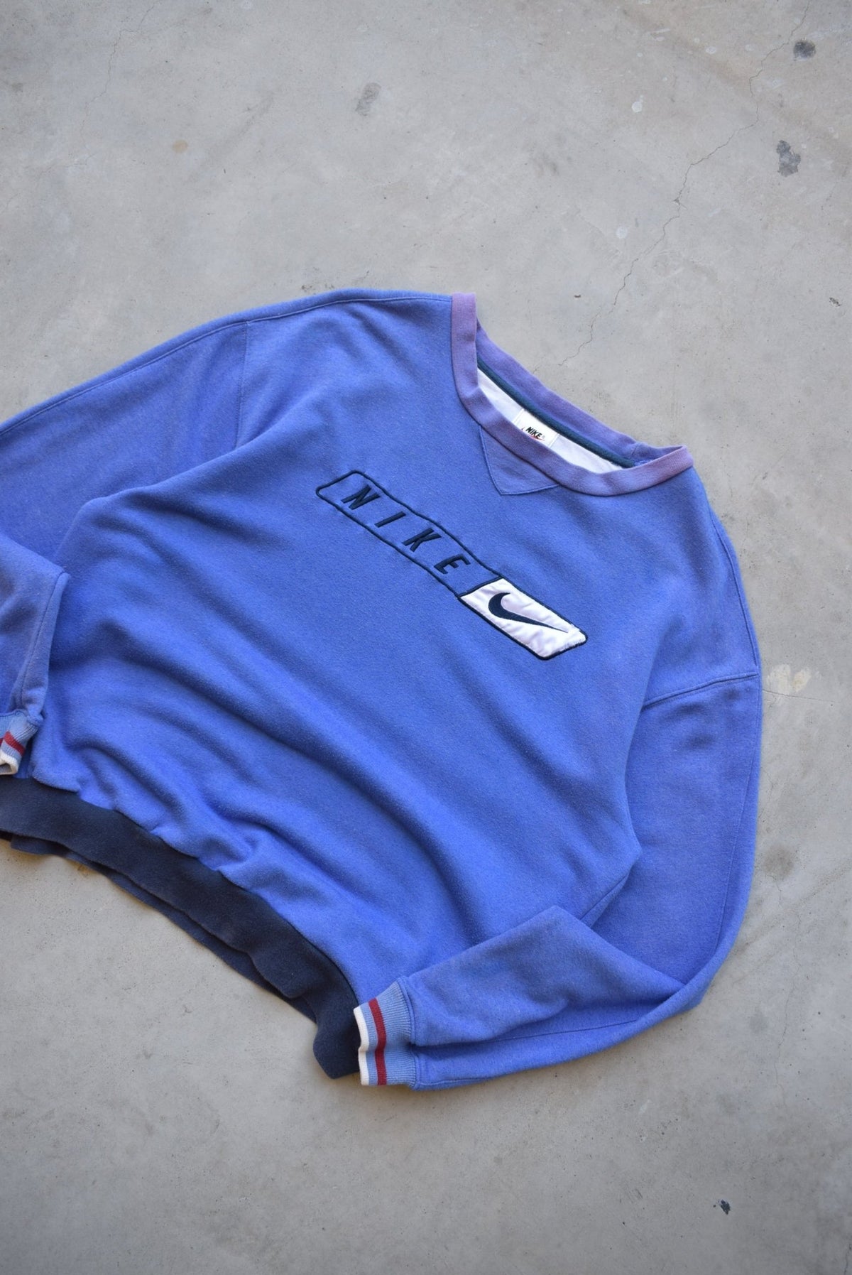 Bootleg Nike Baby-Blue Embroidered Spellout Crewneck — 1990s (S/M) - Retrospective Store