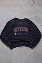 Champion Pro-Line x NFL Minnesota Vikings Black Embroidered Crewneck — 1990s (XL/XXL) - Retrospective Store