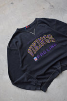 Champion Pro-Line x NFL Minnesota Vikings Black Embroidered Crewneck — 1990s (XL/XXL) - Retrospective Store