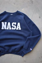 Champion x NASA Navy Embroidered Spellout Crewneck — 2000s (M) - Retrospective Store