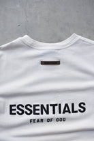 Essentials Fear of God Beige Spellout Tee — 2000s (M) - Retrospective Store