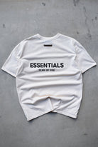 Essentials Fear of God Beige Spellout Tee — 2000s (M) - Retrospective Store