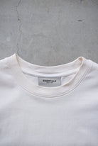 Essentials Fear of God Beige Spellout Tee — 2000s (M) - Retrospective Store