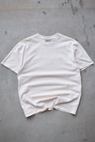 Essentials Fear of God Beige Spellout Tee — 2000s (M) - Retrospective Store