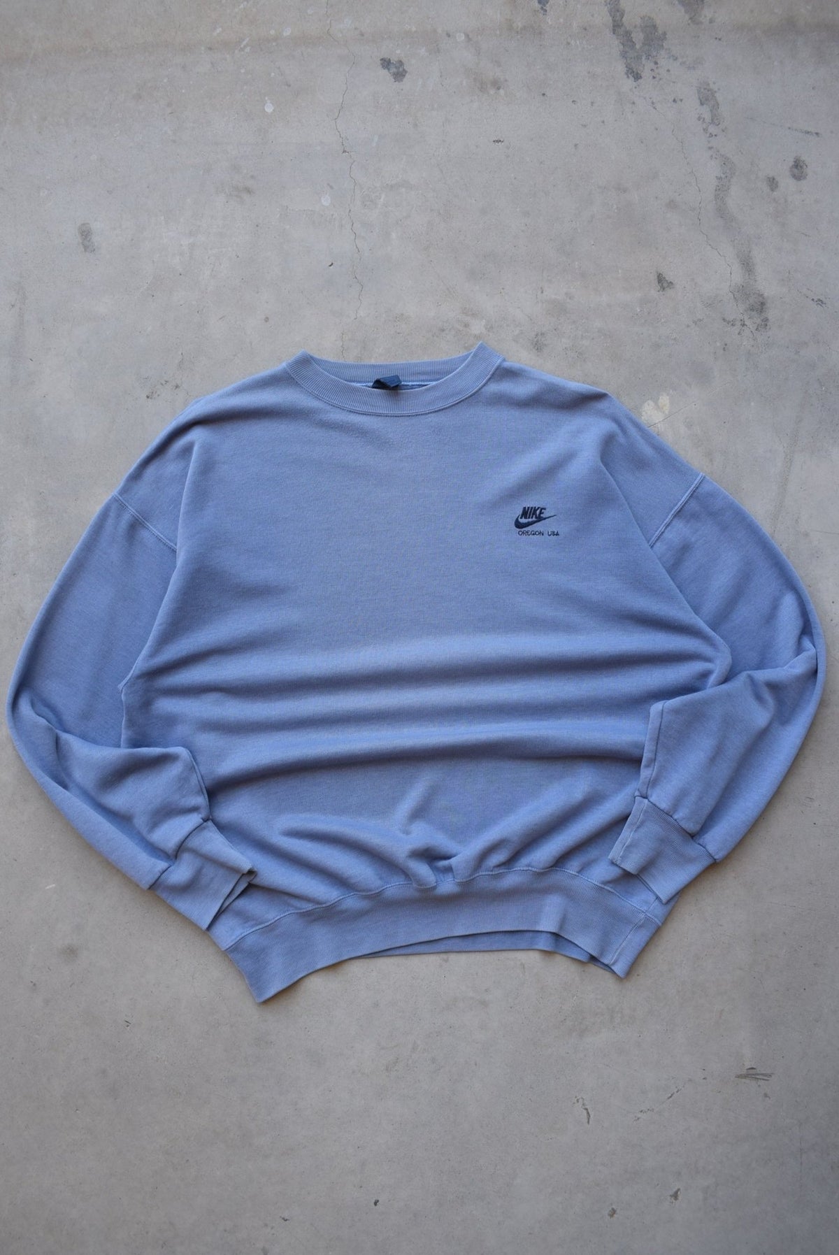 Nike Baby-Blue Embroidered Spellout Crewneck — 1980s (L/XL) - Retrospective Store