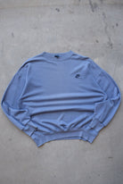 Nike Baby-Blue Embroidered Spellout Crewneck — 1980s (L/XL) - Retrospective Store