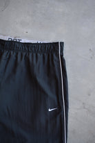 Nike Black Embroidered Swoosh 3/4 Track Pants — 2000s (S) - Retrospective Store
