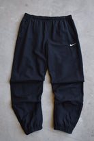 Nike Black Embroidered Swoosh Track Pants — 2000s (M) - Retrospective Store