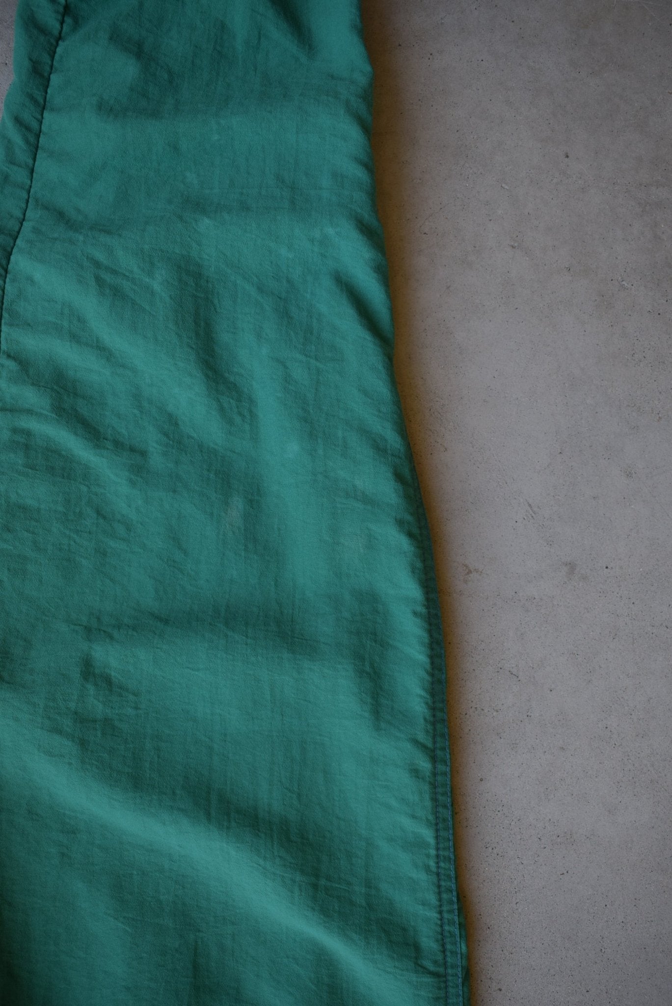 Nike Green Embroidered Spellout Track Pants — 1990s (M) - Retrospective Store