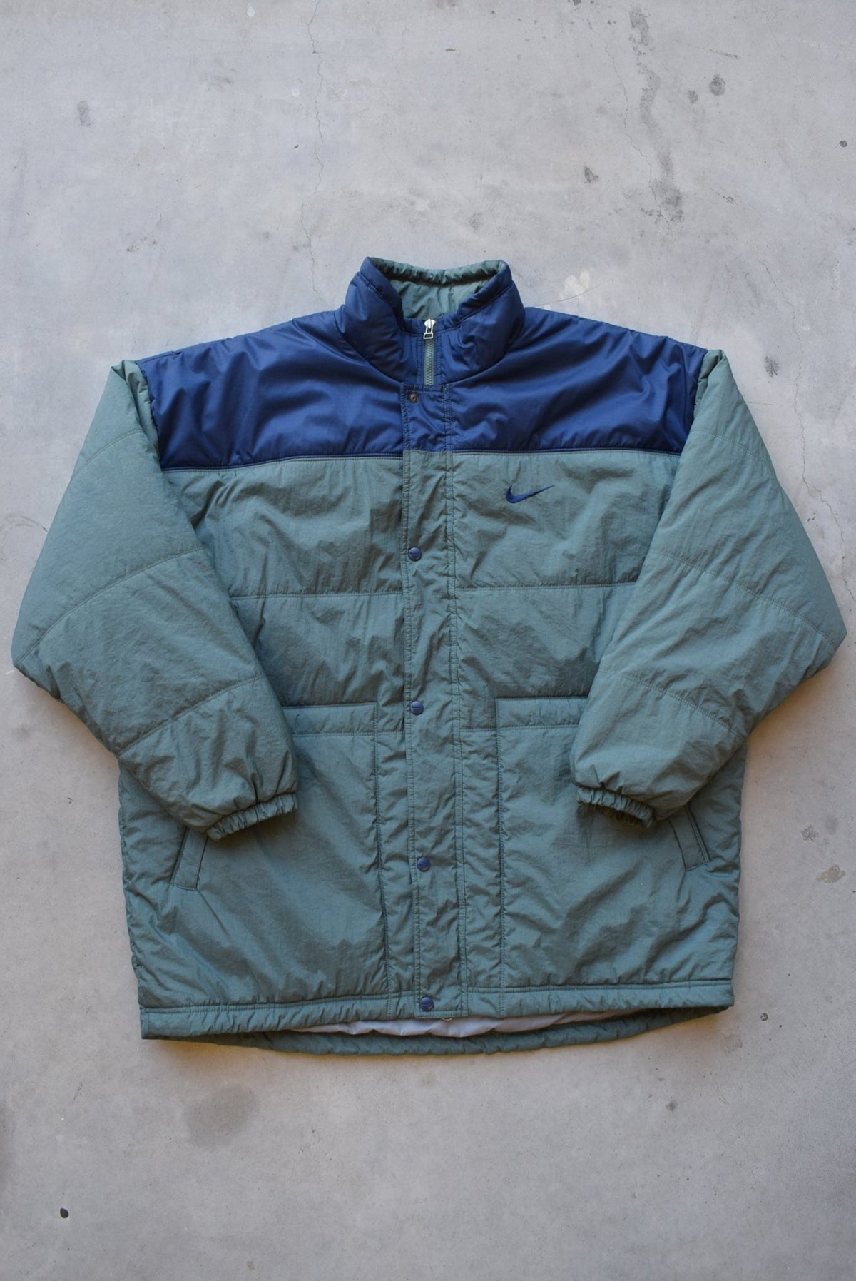Nike Green & Navy Embroidered Swoosh Puffer Jacket — 1990s (XL/XXL) - Retrospective Store